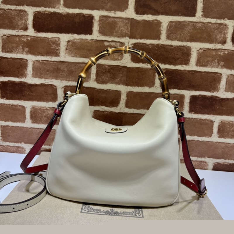 G*u*i top handle bags